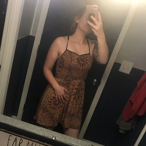 Multi-colored romper size M. $20 shipped to you